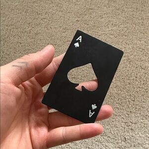 Metal playing card bottle opener